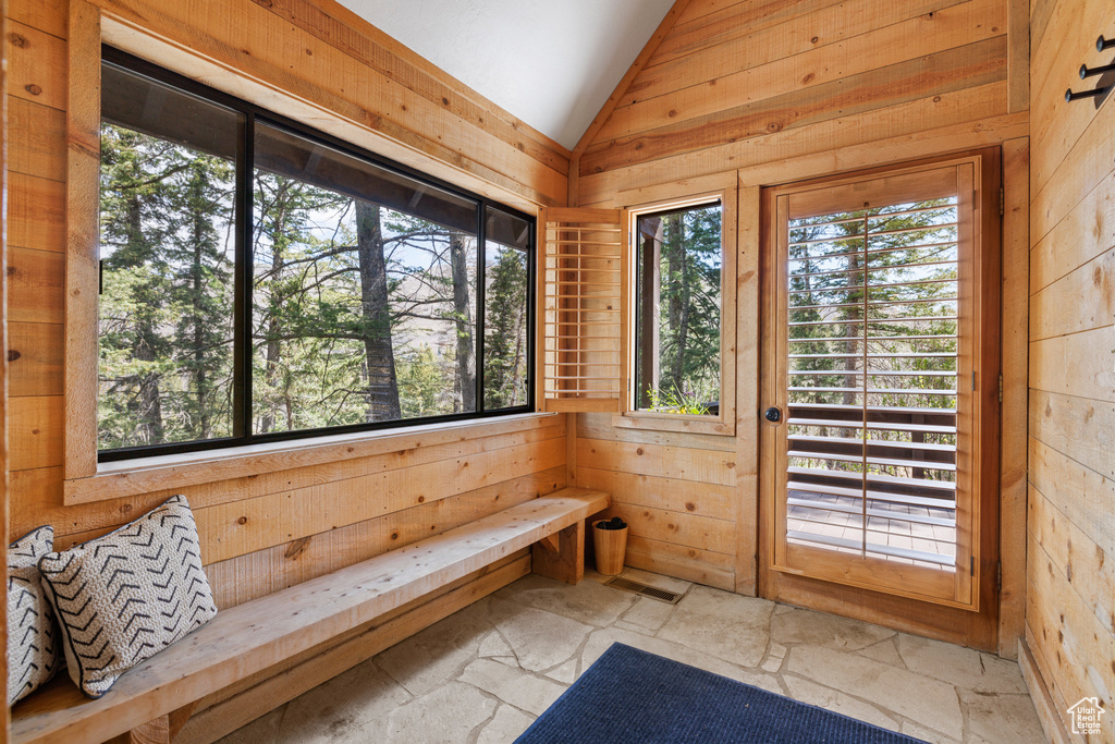 Sunroom featuring lofted ceiling and a sauna