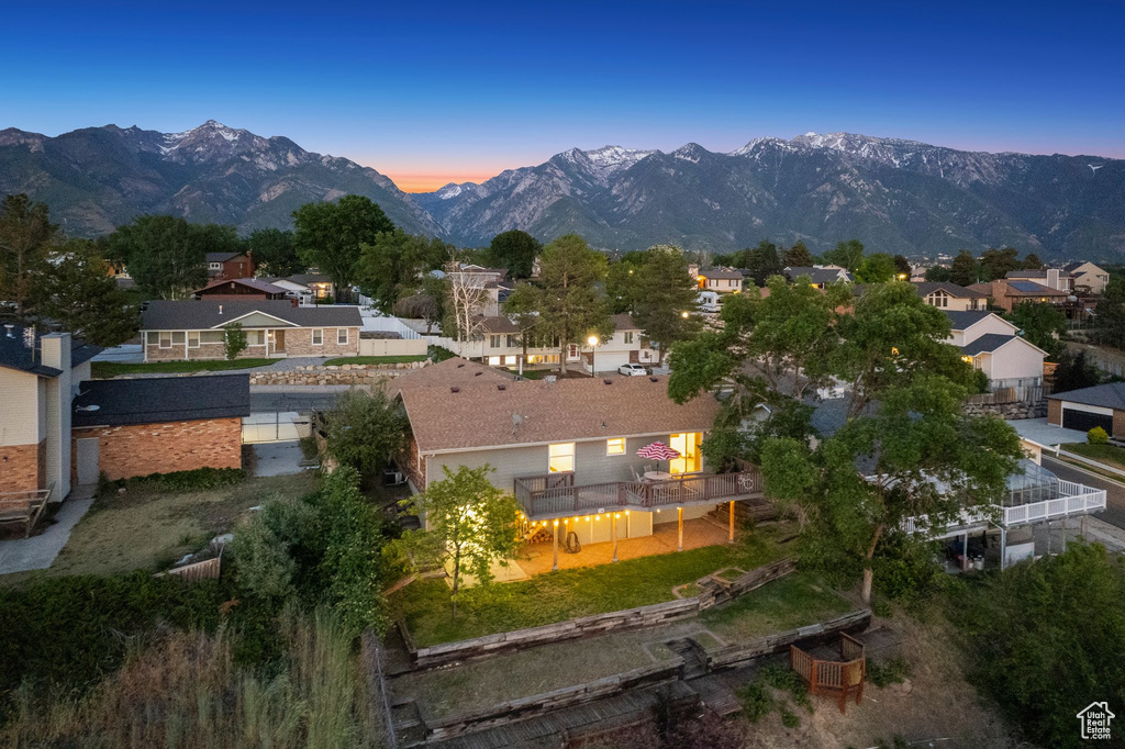 View of mountain background featuring nearby suburban area