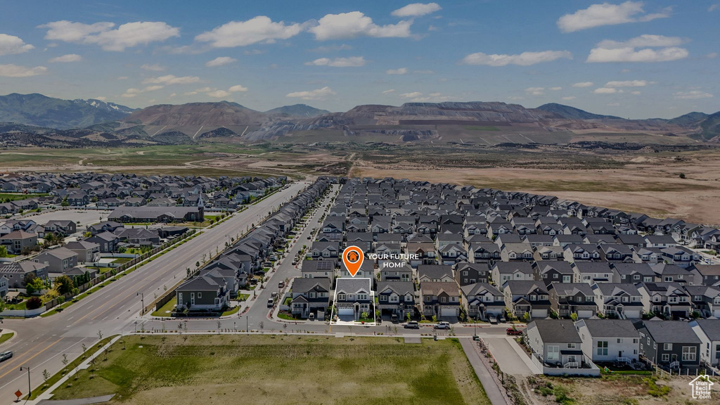Aerial perspective of suburban area featuring mountains