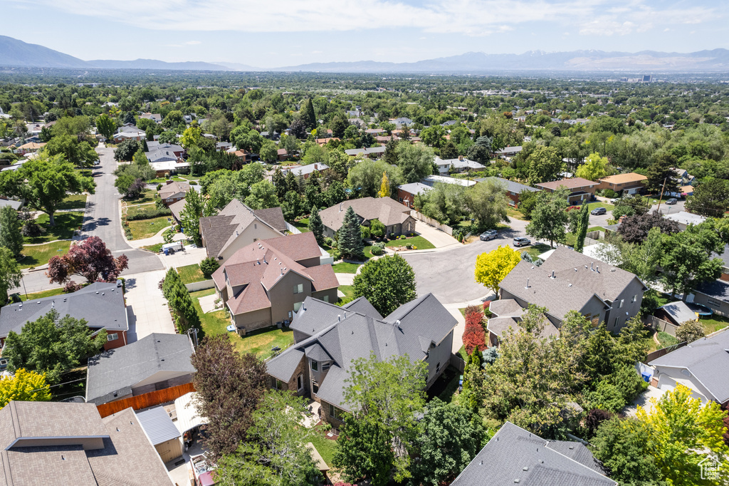 Aerial view of residential area with mountains