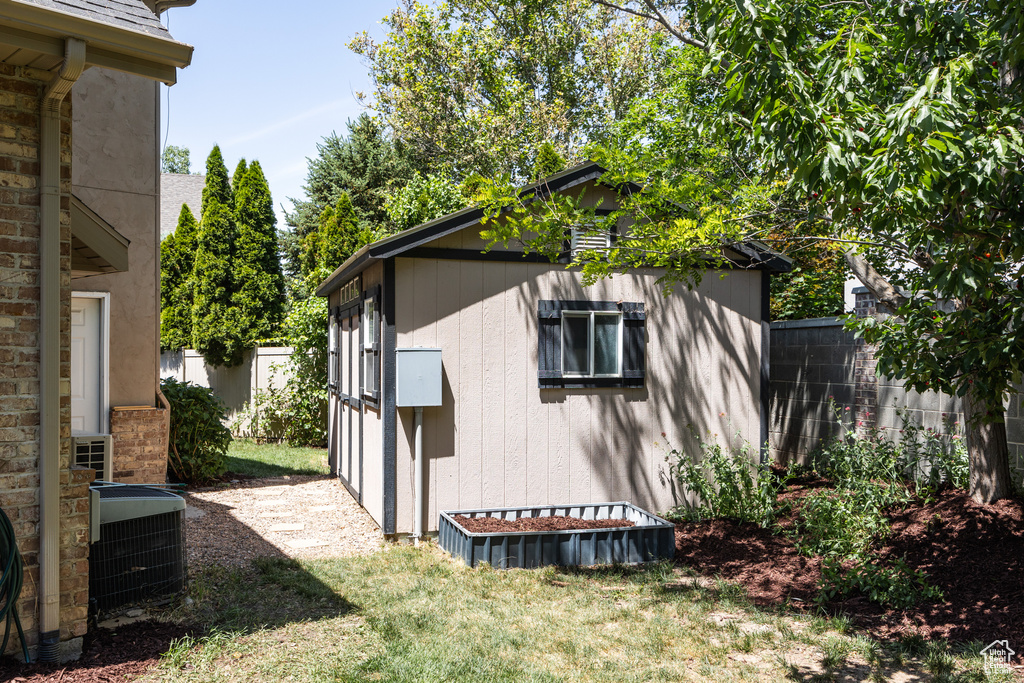View of shed with central AC