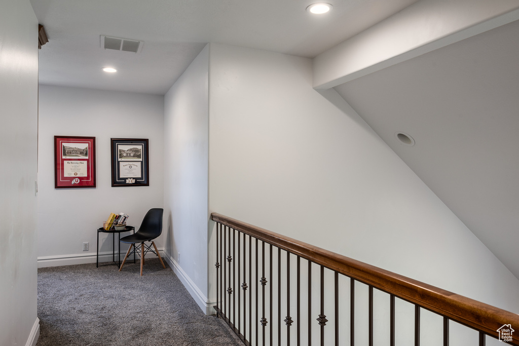 Hall with carpet floors, baseboards, and recessed lighting
