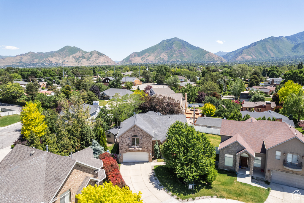 Aerial perspective of suburban area with mountains