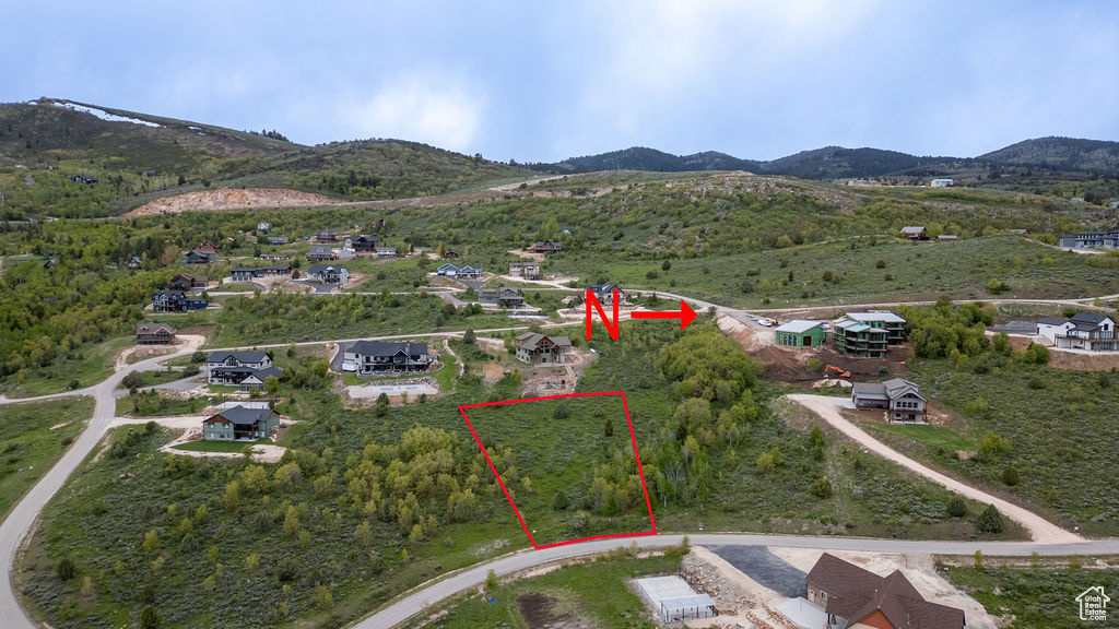 View of property location with property parcel outlined and a mountainous background
