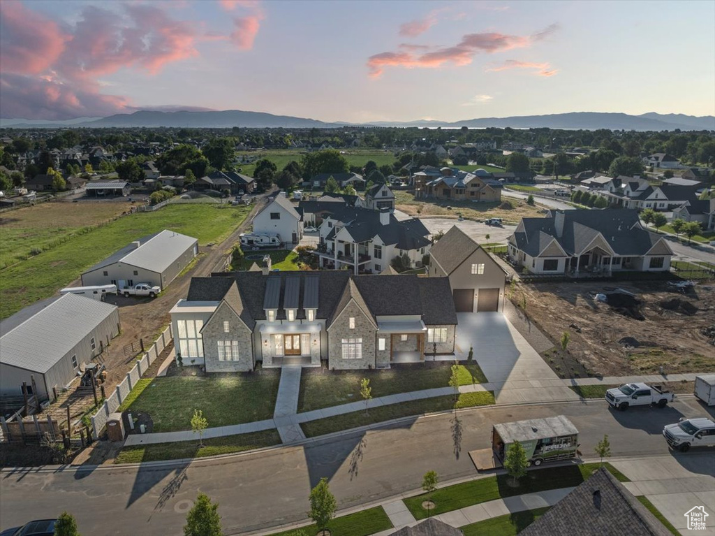 Aerial view at dusk of a mountain view and a residential view