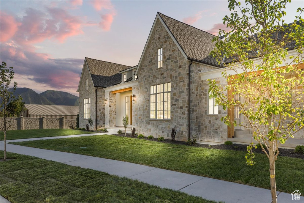 View of front of home featuring stone siding