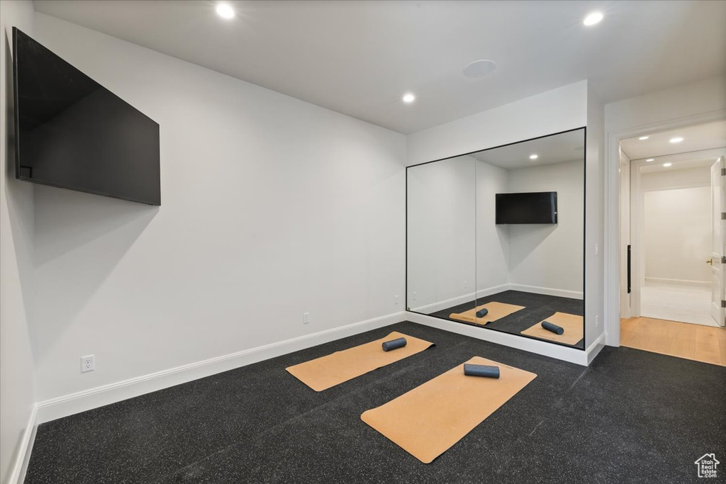 Unfurnished bedroom with recessed lighting and baseboards