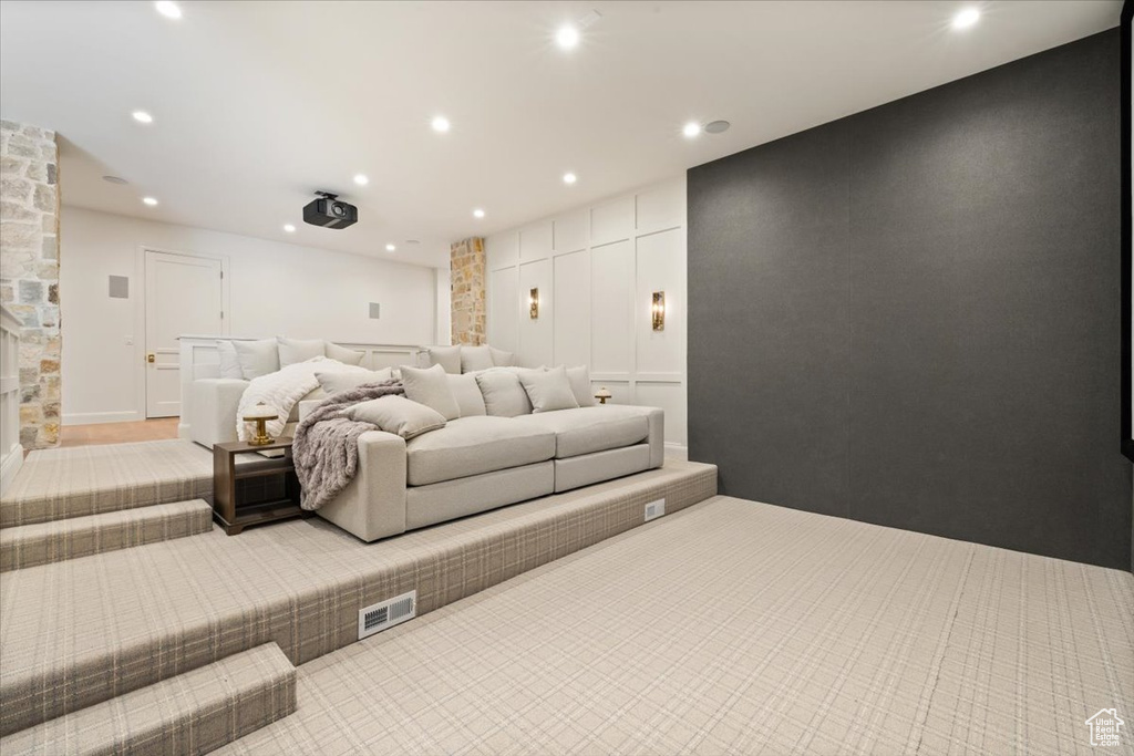 Home theater room featuring recessed lighting