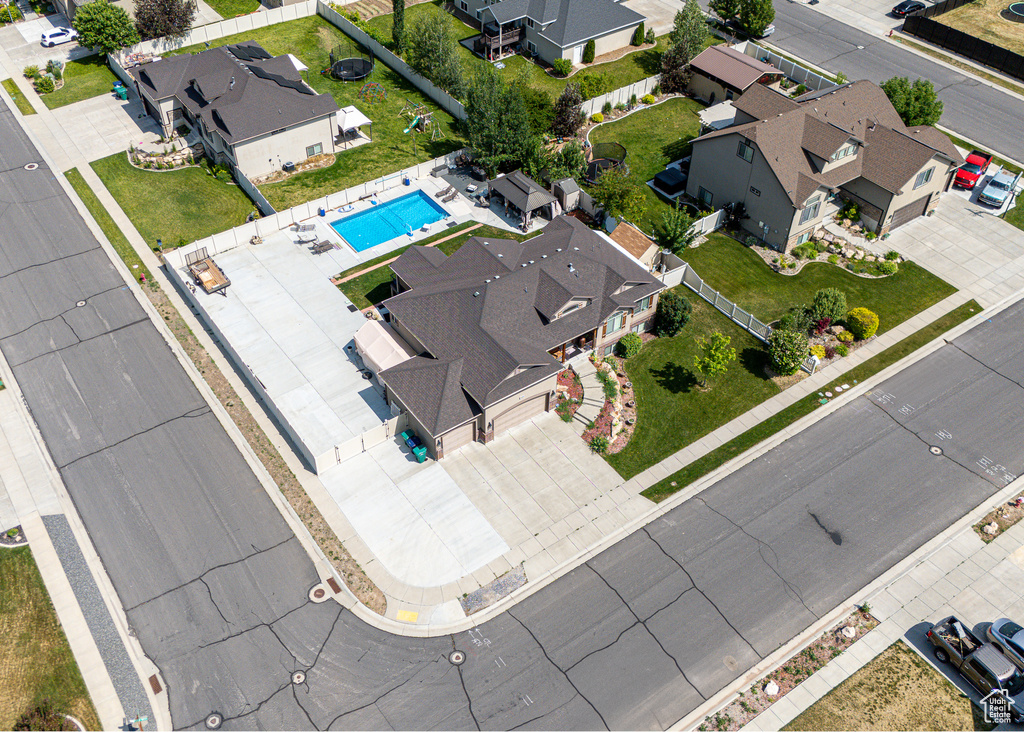 Aerial perspective of suburban area with a pool area
