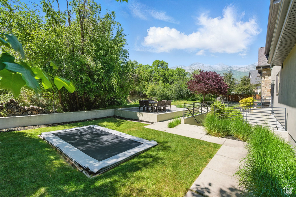 View of yard with a mountain view