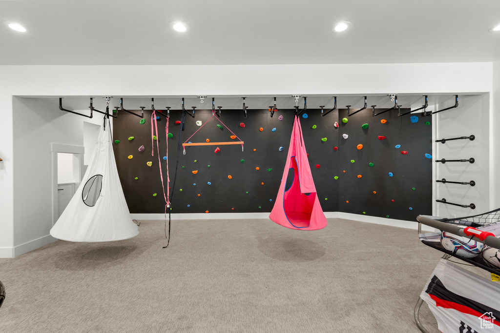 Game room with carpet, baseboards, and recessed lighting