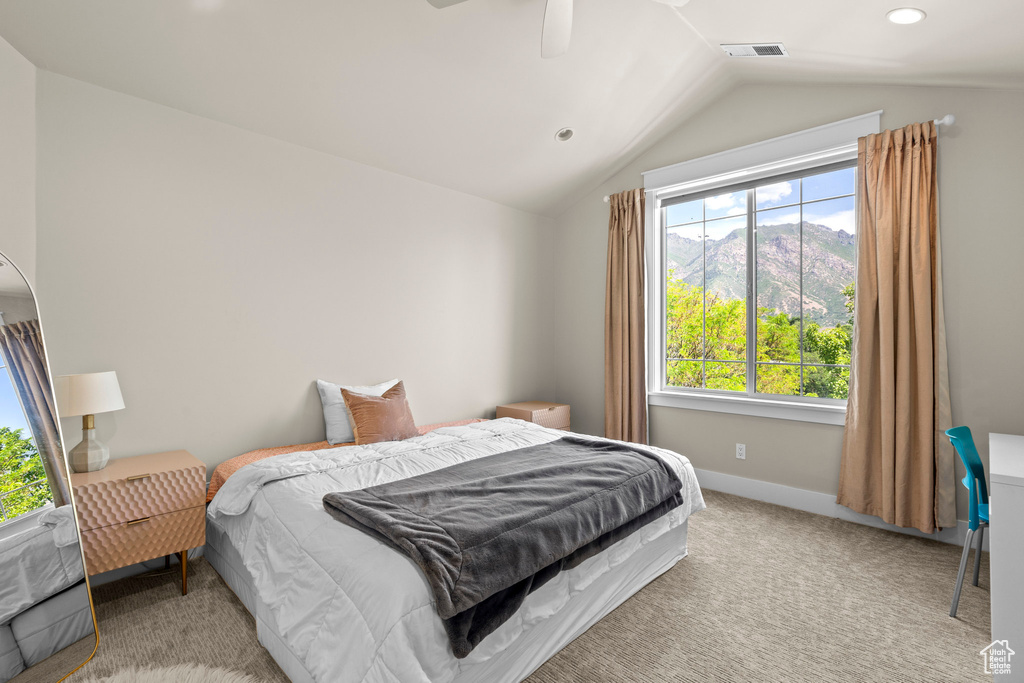 Carpeted bedroom featuring lofted ceiling, baseboards, recessed lighting, and ceiling fan