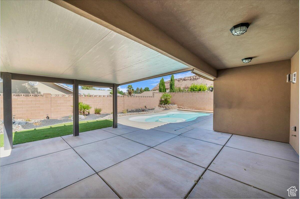 Fenced backyard featuring a patio area