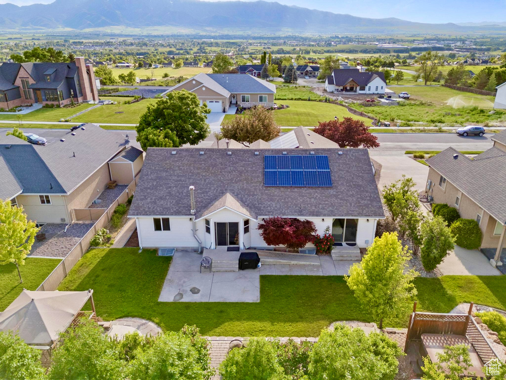 Aerial view of residential area with a mountain backdrop