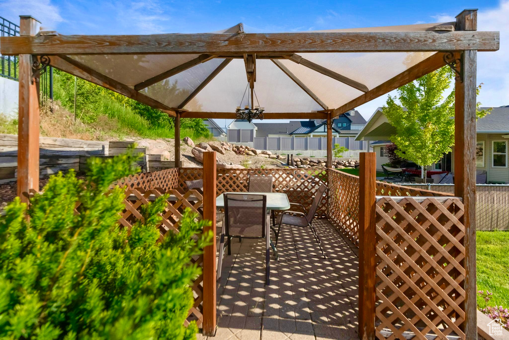 View of patio / terrace featuring a gazebo and outdoor dining area