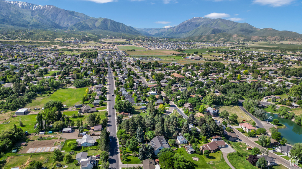 Aerial view of property\'s location featuring a water and mountain view