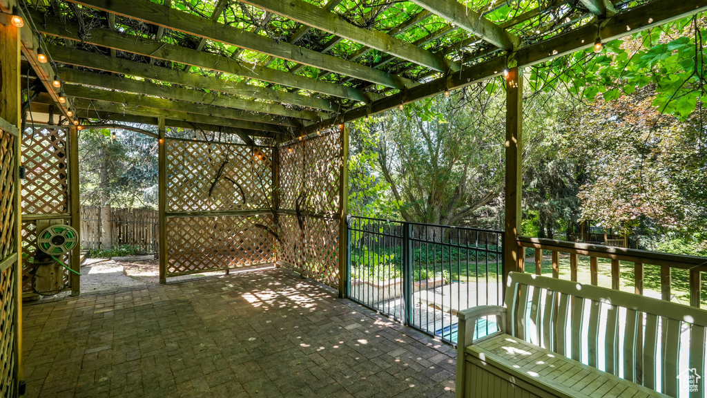 View of patio with a pergola