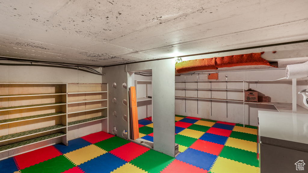 Finished basement with tile patterned floors