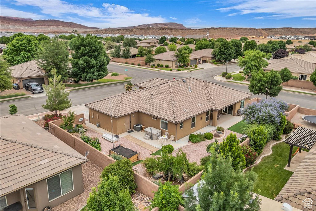 Aerial perspective of suburban area with mountains