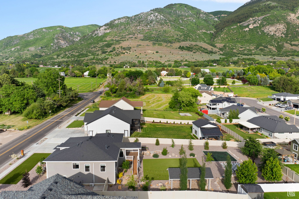Aerial view of residential area with a mountainous background