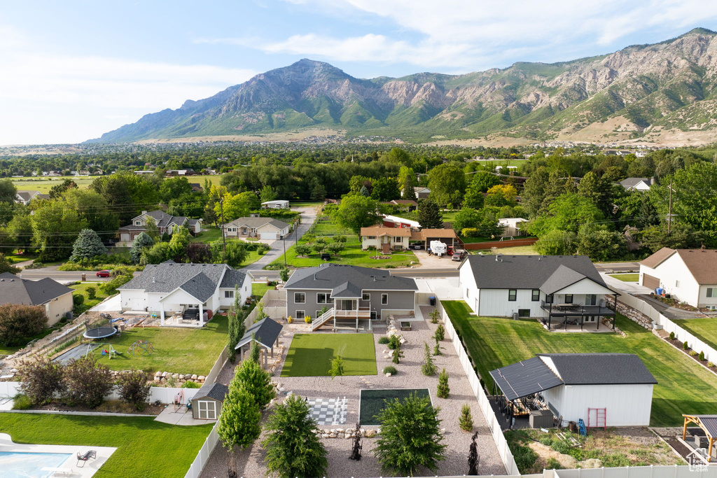 View of mountain backdrop with nearby suburban area