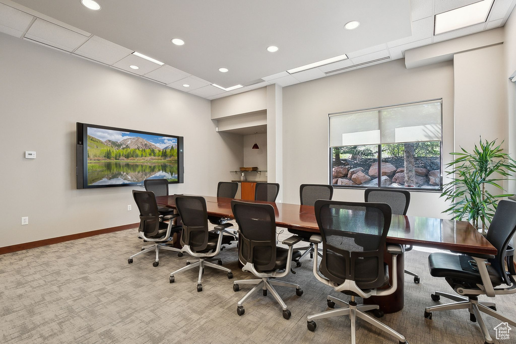 Carpeted home office with recessed lighting and baseboards
