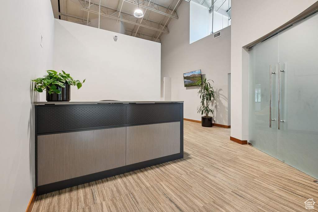Welcome area featuring a high ceiling