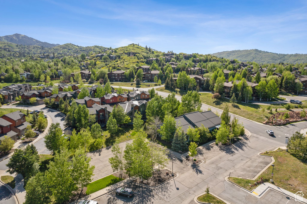 Aerial view of residential area featuring a mountain backdrop