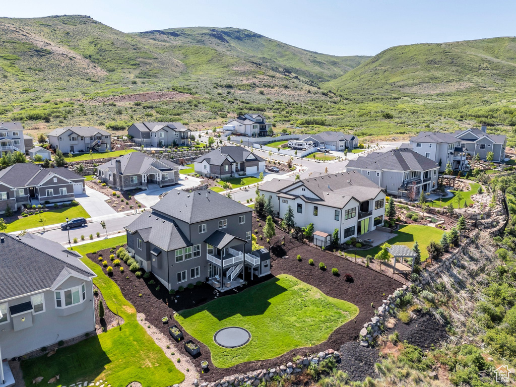 Aerial perspective of suburban area featuring mountains