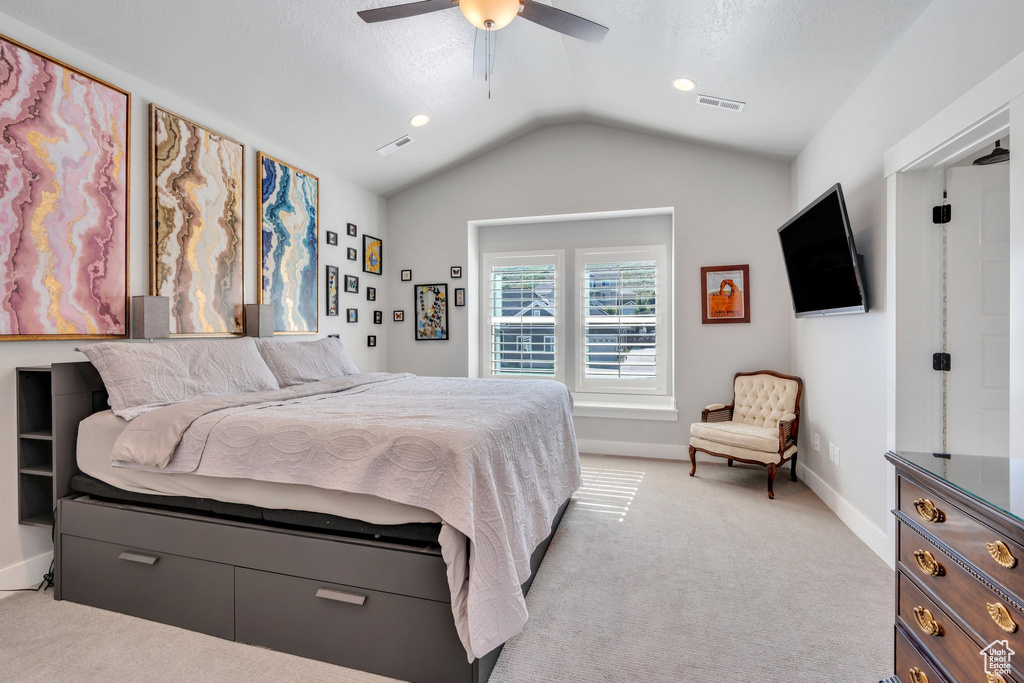 Bedroom featuring lofted ceiling, carpet flooring, baseboards, ceiling fan, and recessed lighting