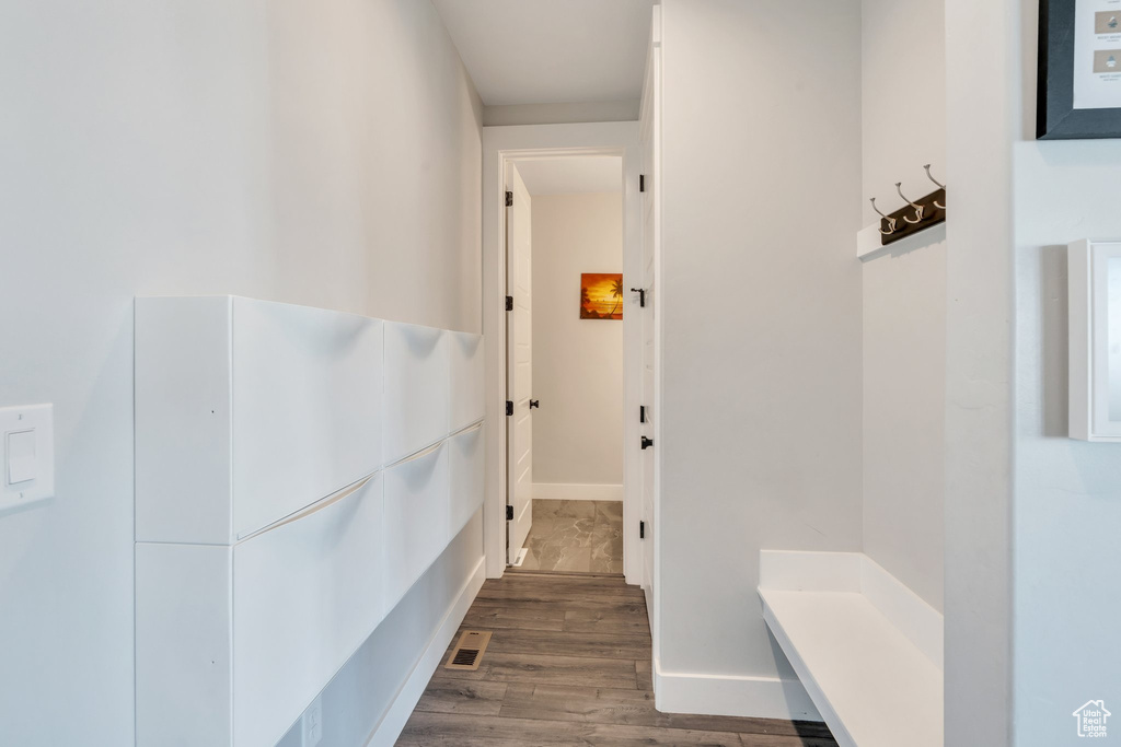 Mudroom featuring wood finished floors
