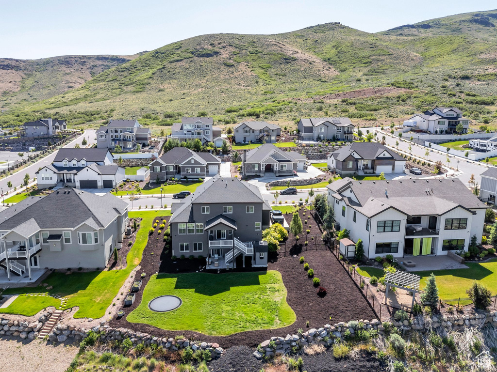 Aerial perspective of suburban area with mountains