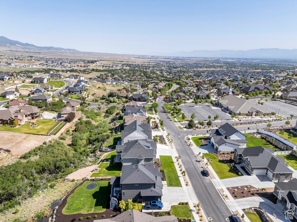 Aerial perspective of suburban area featuring mountains