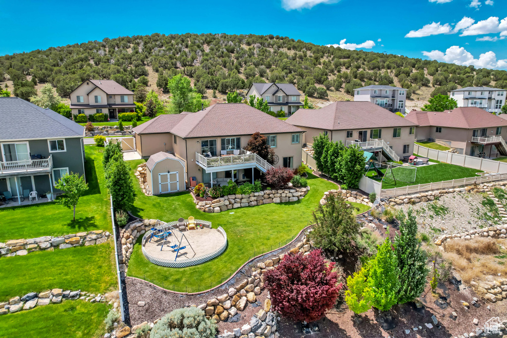 Aerial view of residential area with a heavily wooded area