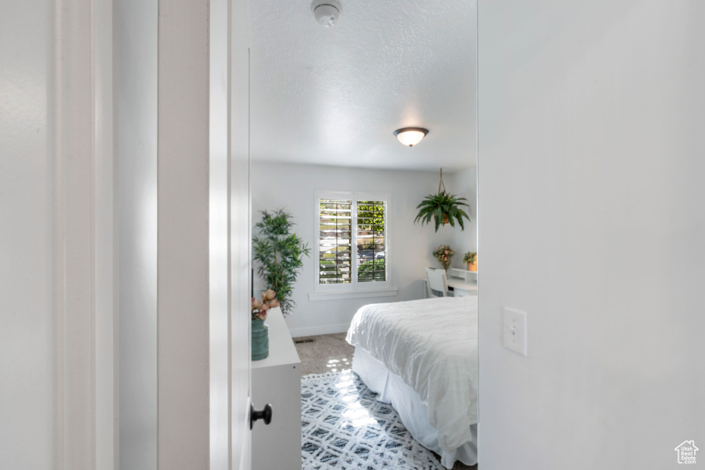 Bedroom featuring baseboards