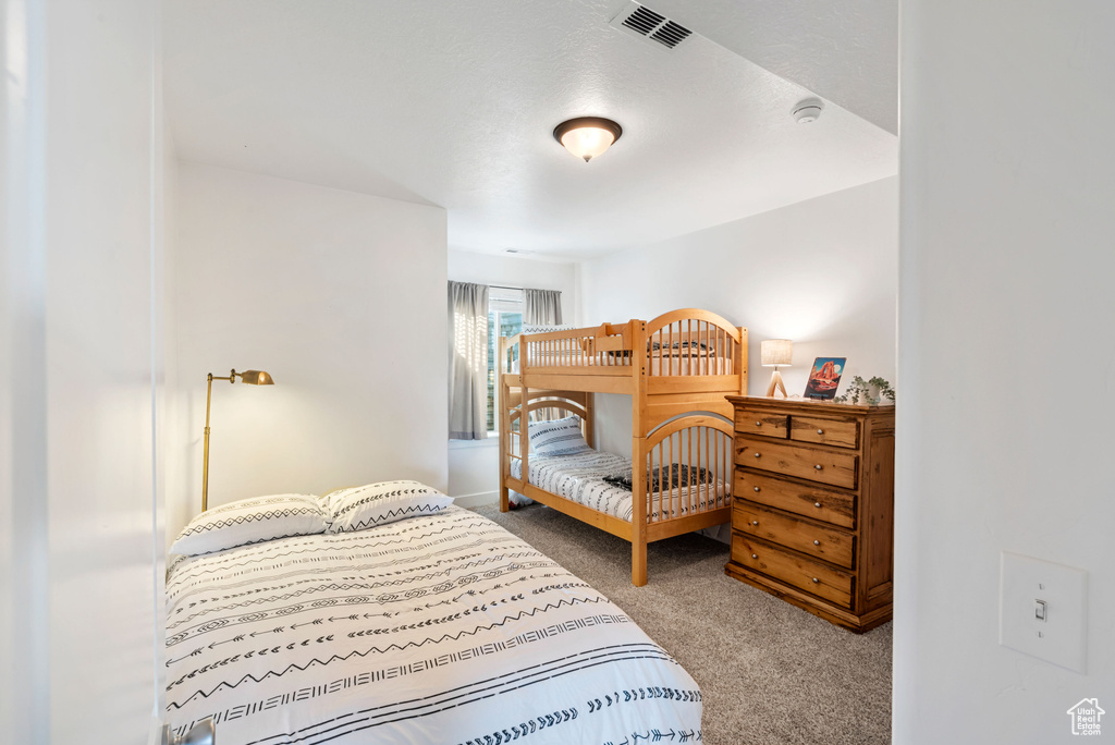 Bedroom featuring carpet