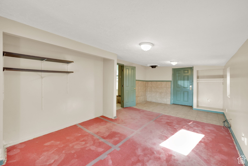 Spare room with carpet flooring and baseboards