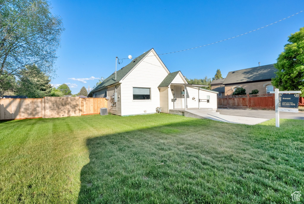 Back of property with a patio area