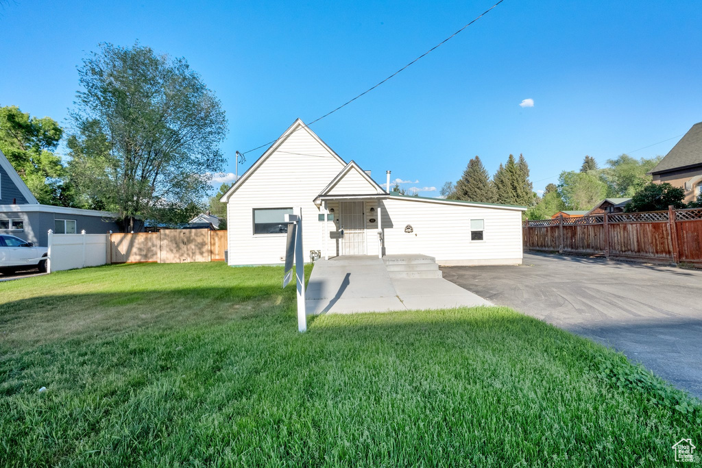 View of front of home featuring a patio area