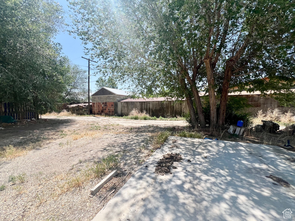 View of yard with a patio