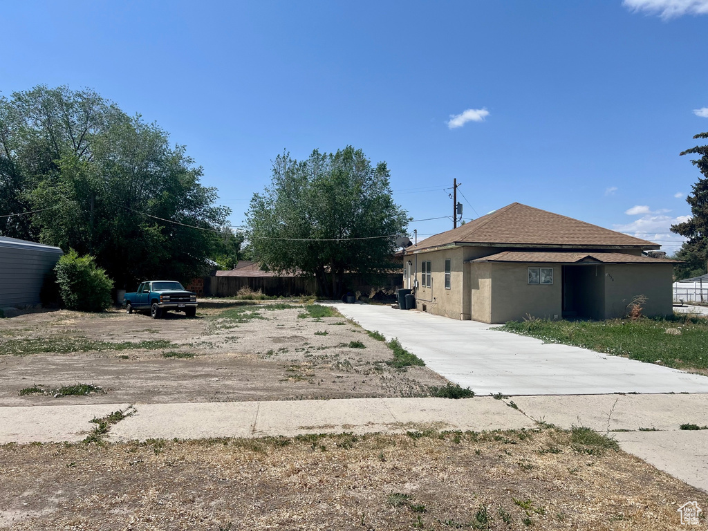 View of front of home featuring stucco siding