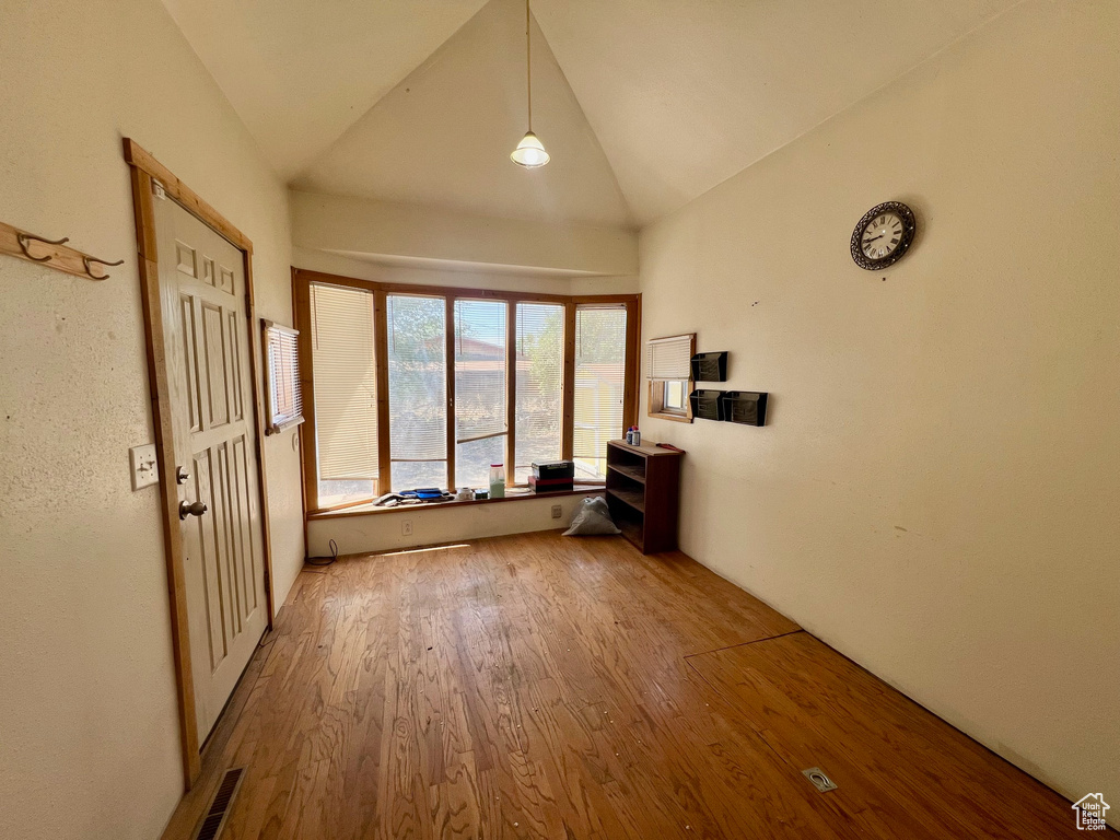 Interior space featuring lofted ceiling