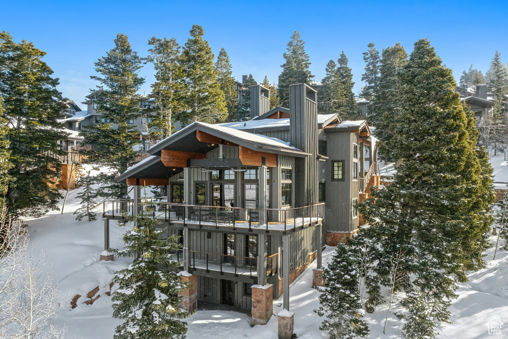 View of snow covered property