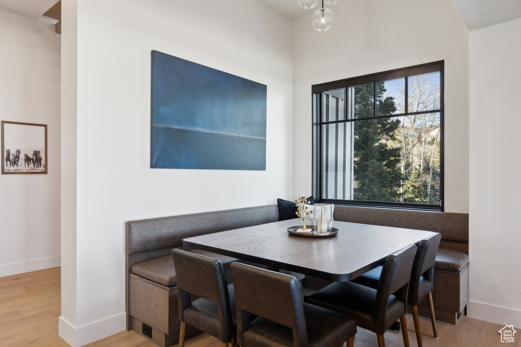 Dining room featuring baseboards and wood finished floors