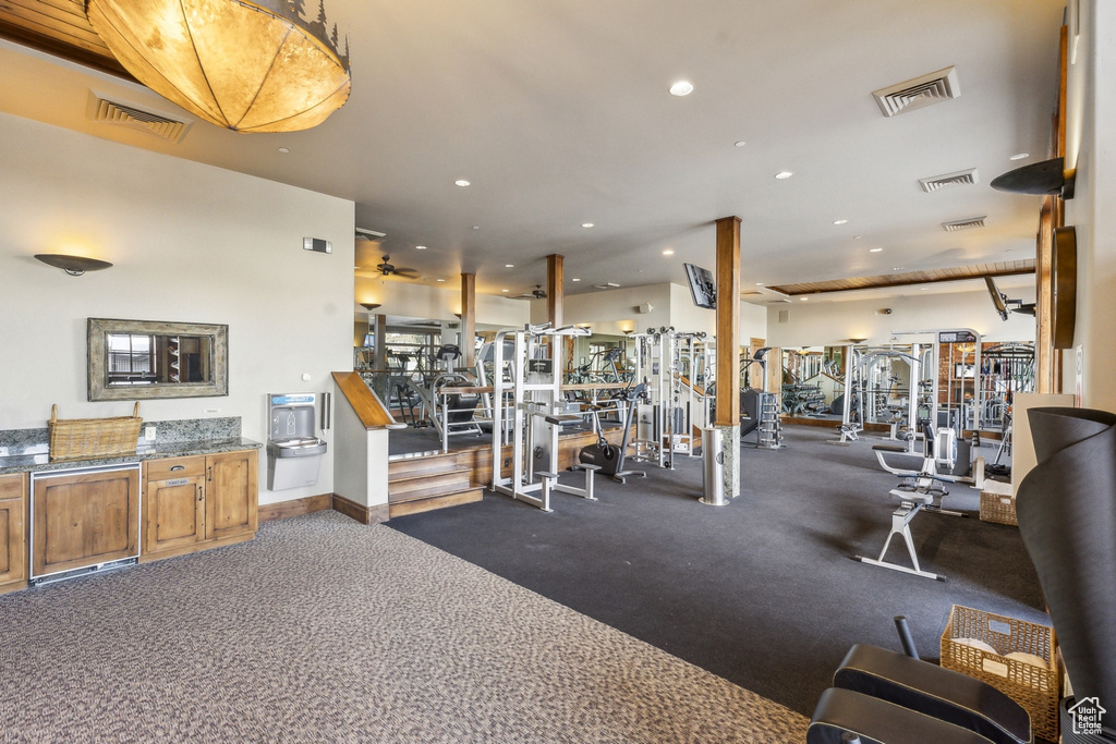 Exercise room featuring recessed lighting