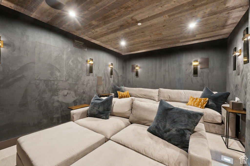 Cinema room with wood ceiling, recessed lighting, and carpet floors