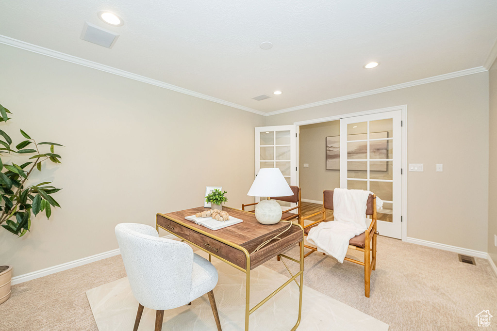 Home office featuring light carpet, baseboards, crown molding, and recessed lighting