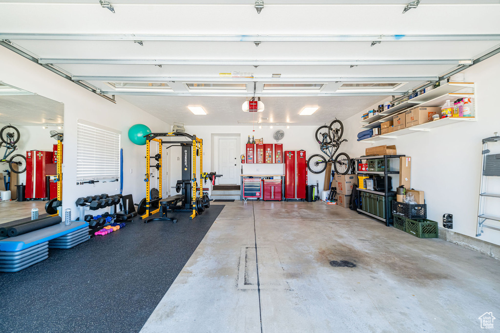 Garage featuring a garage door opener