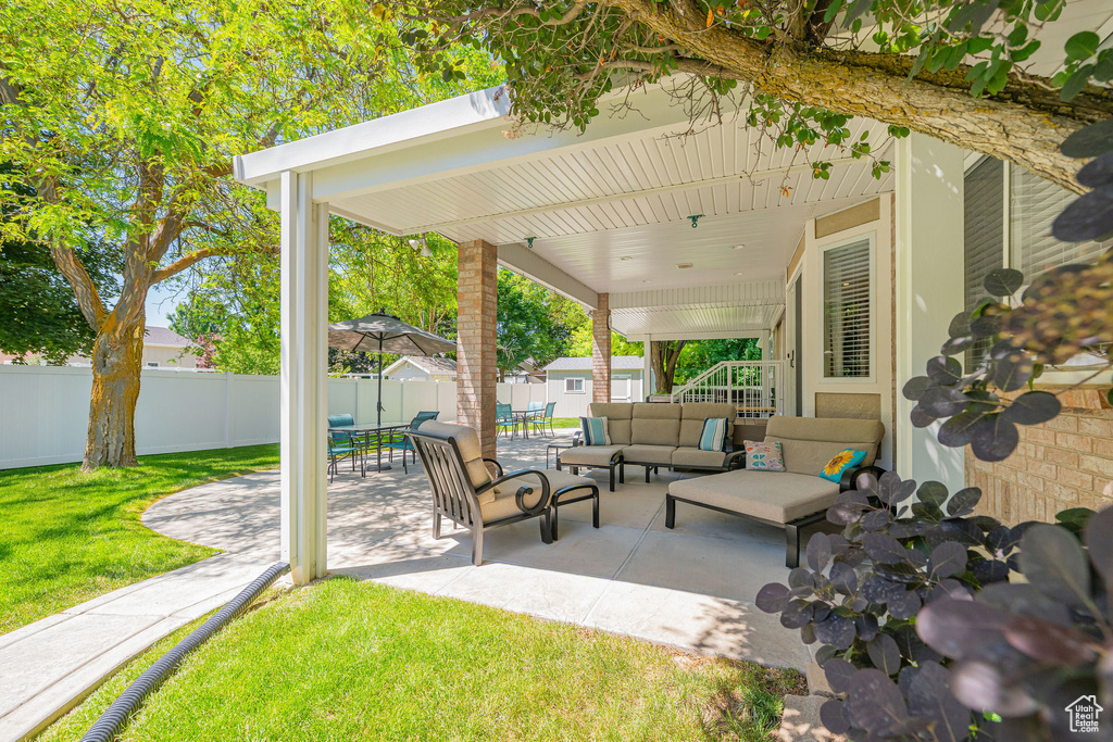 View of patio with outdoor lounge area