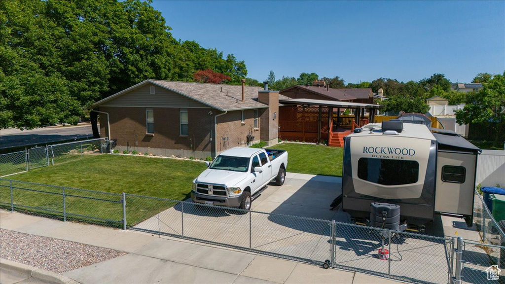 View of front of property featuring a gate